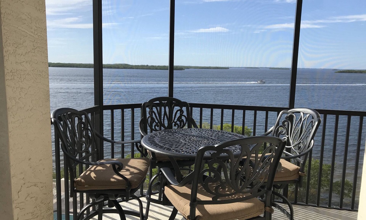 Punta Rassa Condo | Beachfront Stunning Corner Condo- Amazing Water views on Private Beach of Resort