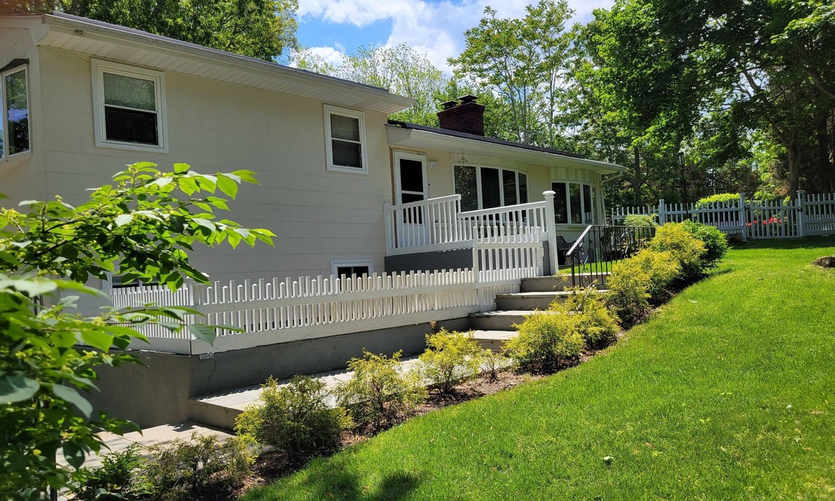Hampton Bays House | Charming Split-Level House with heated pool, hot tub & a brand-new septic system