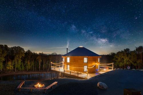 Stanley Villa | Luray Yurt - World's Largest Yurt - Sleeps 16, Hot Tub, Sauna, Pond