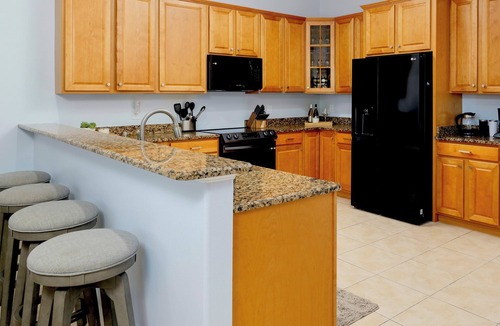 Convair Cove House | 4BR Waterfront Retreat - Private Dock, Kayaks, Hot Tub & Tiki Bar Walk to Beach