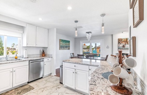 Butler Beach House | Atlantic View Heated Pool/Spa/Firepit/Beach/Golf/Sleeps 12
