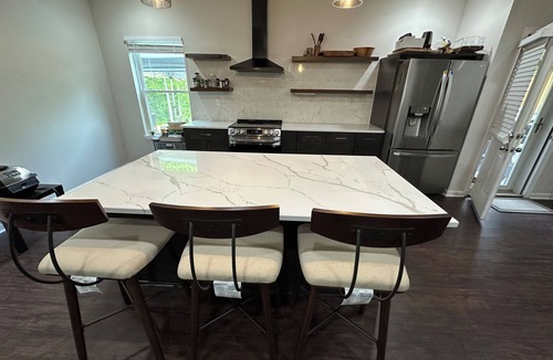 Fairburn Apartment | Backyard event space with basement apartment with kitchen, fitness room.