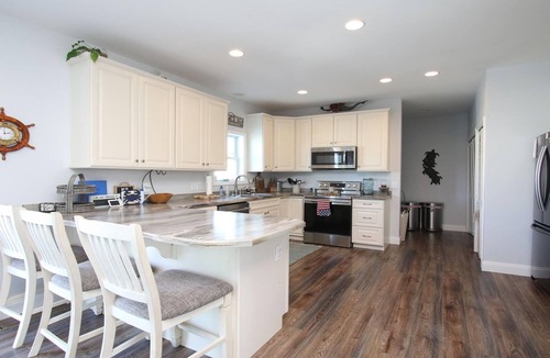 Beach Haven West House | Beach Haven West. Pet Friendly. Waterfront. Lagoon front. Beach Badges. WIFI.