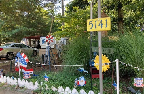 Greenbush RV Rental | Charming camper within Trails End ChinoteagueBay Resort in Horntown VA
