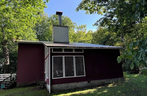 Sackets Harbor Cabin | Clean, Rustic 4-bedroom cabin nestled in the woods in Sackets Harbor