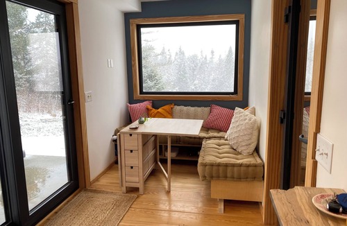 Rochester House | Contemporary shipping container home atop a scenic knoll in Rochester, Vermont.