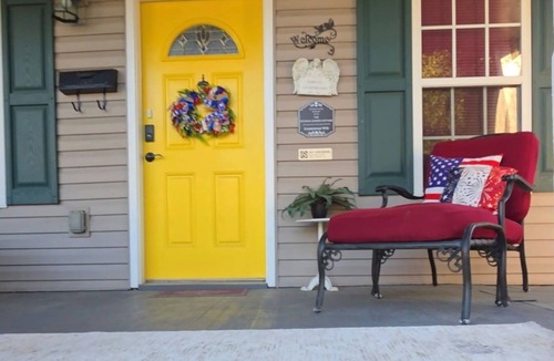 Williamsport Cottage | Enjoy Fall on our big porch! Check out discounts, bike storage and amenities!