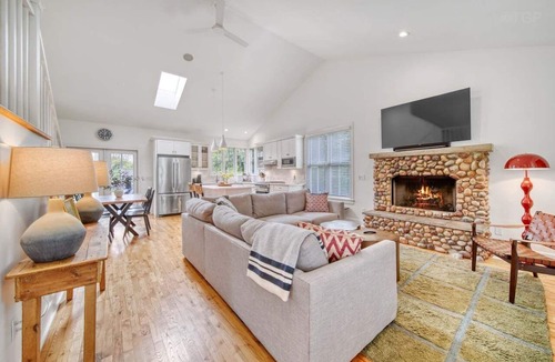 Fennville House | Experience tranquility at The Red Farmhouse in secluded Fennville, MI, with 4 bedrooms.
