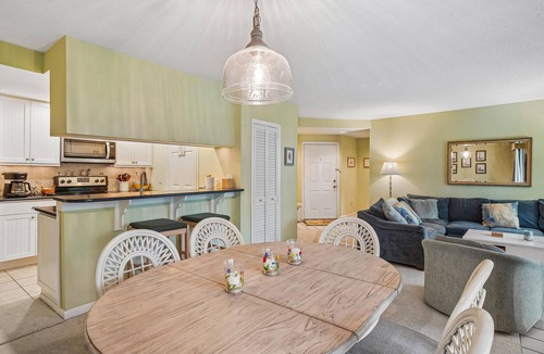 Bethany Beach Condo | Free Golf at Bear Trap Dunes and MORE! 2 Bedroom 2 bath. first floor Sea Colony West unit with a beautiful view of the lake.