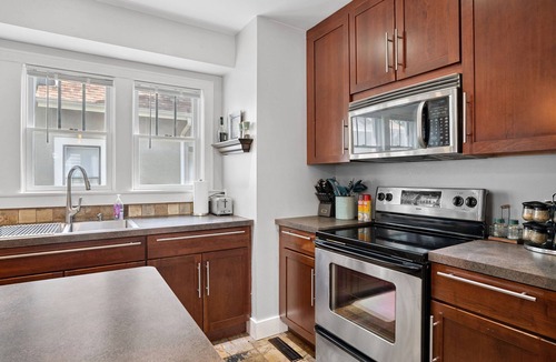 Robbinsdale House | Fully Loaded Entire Home, Fast Wi-Fi, Pet Friendly, and Fenced Backyard