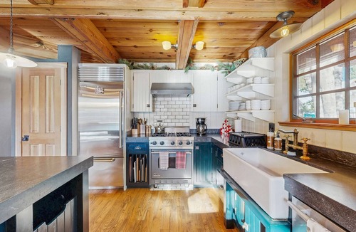 Serene Lakes House | Luxury lakefront home with private hot tub, on-site dock, fireplace & HOA beach