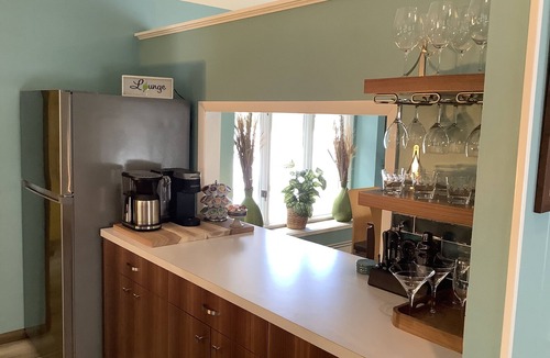 Fennville House | MCM Hilltop Hideaway with a River View. Near Saugatuck. Family & Pet Friendly!