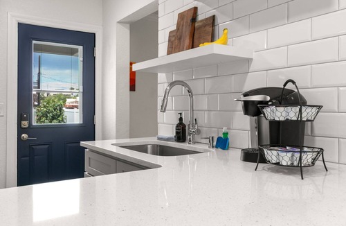 Courier City - Oscawana Apartment | NEW Soho Sanctuary - Gorgeous Apartment Steps to S Howard Ave With Fenced Yard