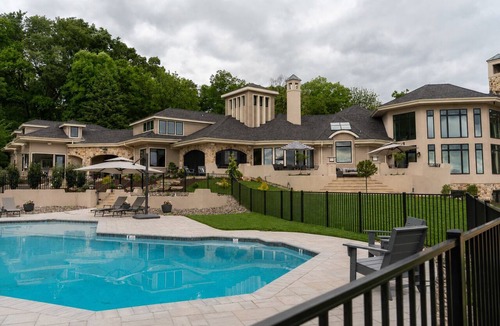 Wernersville House | Overlook Retreat Manor is a luxury private estate on 100 scenic acres for up to 24 guests. Enjoy the pool, hot tub, game room, sports court, and breathtaking sunset views. The kind of place people talk about long after they leave.