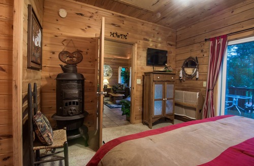 Branson Cedars Cabin | Overlooking pool & playground, walking distance to Thunder Ridge Arena.