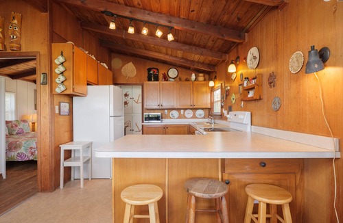 Butler Beach House | Pet Friendly Oceanfront Cottage -Deck Dining+ Direct Access Path to the Beach!