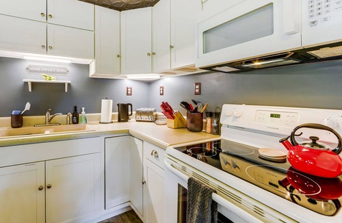 Sylva Cottage | Pet Friendly Riverfront Home near WCU! Trout fishing near Cullowhee & Smoky Mtns