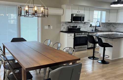 Beach Haven West House | Pet friendly 3-bedroom house with saltwater heated pool. EV charger.