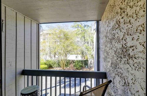 Sea Pines Condo | Professionally decorated townhome with multiple balconies, pool, & washer/dryer