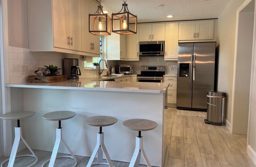 Redington Beach House | Relax and have some fun in this Salt water heated pool home, 5min walk to beach
