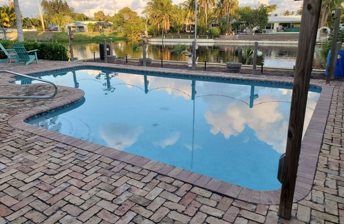 Boynton Beach House | Relax at My Pool Home Watch the boats go by 6 Min to the Beach Read the Reviews