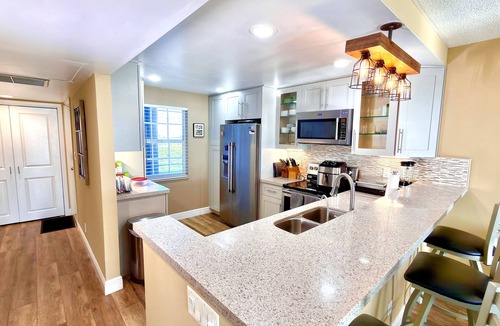 Survey Creek Condo | Renovated 3 bedroom 2 bath condo on the 8th floor overlooking the golf course.