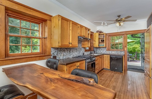 Gardiner House | Riverfront stone cottage Private dock & boats Personal spa private resort