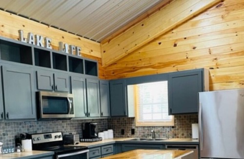 Arley Cabin | Rustic chic cabin on the lake, fire pit and peaceful lake views!