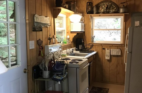 Rock Stream Cottage | Secluded Rustic Seasonal Seneca Lake Cottage Overlooking the Lake