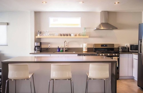 Sherwood Forest and Thistle Development House | Spacious 4-Bedroom Pool House - 10 Mins to Disneyland - AC, Fast WiFi, BBQ