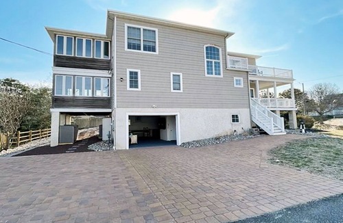 Town Bank House | Spacious Bayside Retreat: Sleeps 18, 1/2 Block from Bay Beach, Game Room