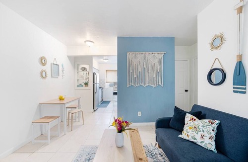 East Little Havana Apartment | Stay in this bright and stylish 1BR in Little Havana, just minutes from Brickell. Enjoy a modern open layout with warm décor, a cozy living area, and a full kitchen. Walk to Calle Ocho cafés, murals, and music, your perfect Miami home base.
