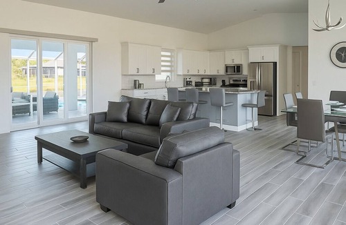 Long Meadow House | Stunning Modern New Construction Home w/Pool, Canal Views, & BBQ
