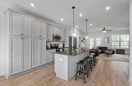 Rio House | This fully furnished, 4 bedroom/3.5 bath townhome immersed in the Belvedere neighborhood is less than 2 years old with all the updates and amenities on the interior for comfortable living. 9-12 month lease preferred for lower monthly rent amount.