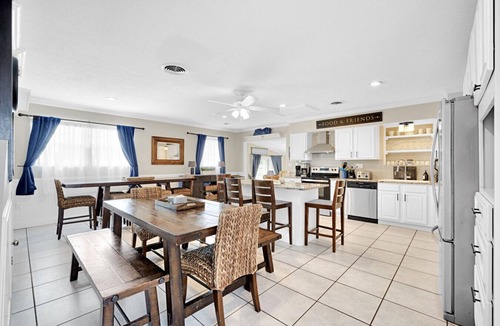 Cocoa Isles House | TIKI BLUE Big beach house with heated pool, hot tub and Tiki Bar.