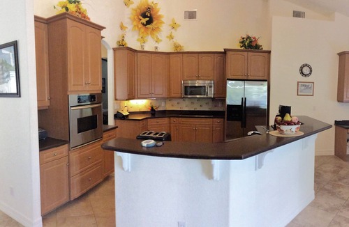 Cape Coral Villa | Villa'Cape Florida 'with heated pool/spa on a wide Gulf access canal