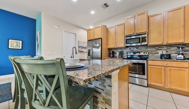 Bright 3B/2.5B townhome at Enclaves at Festival, minutes from Disney & Champions Gate. Private pool, resort amenities, sleeps 8.