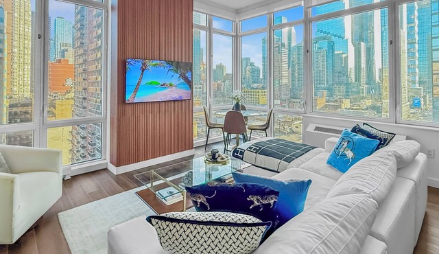 Corner Skyline Living 1BR with Floor to Ceiling Views Walk to Times Square