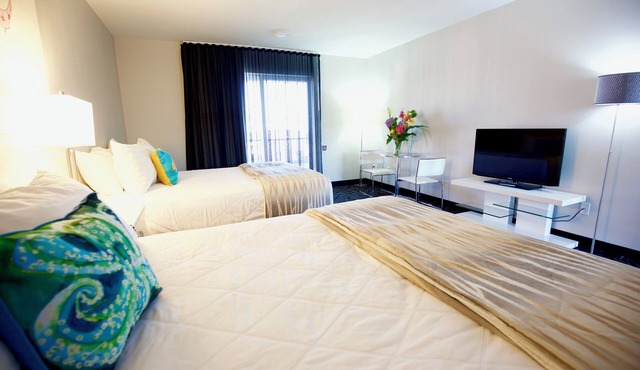 Direct Beach access! 2 queen beds private balcony, plus an ocean to the left.