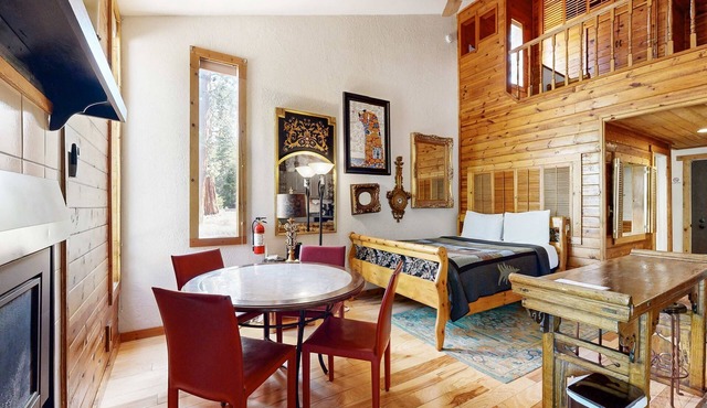 Eclectic second floor condo with loft, balcony, & gas fireplace - family friendly