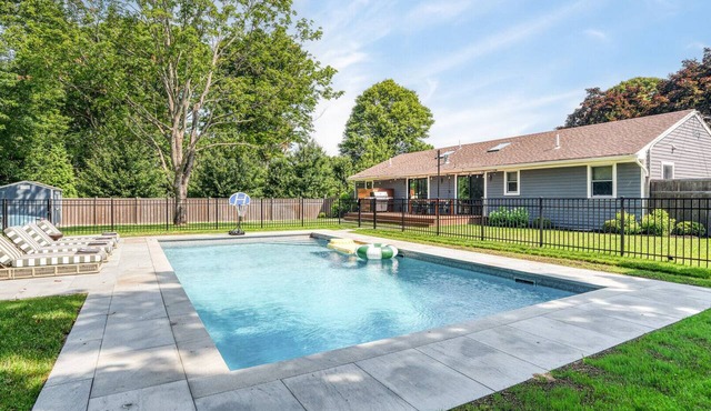 Elevated North Fork Escape with Chic Interiors and Private Poolside Oasis -.