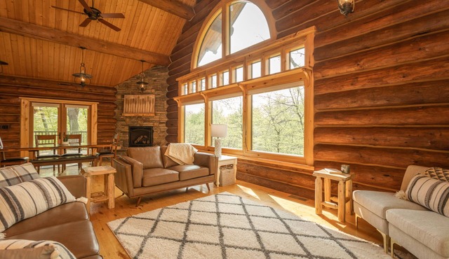 Exceptional Log Cabin centrally located between wonderful lakes, winery, & golf