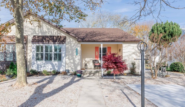 Lovingly renovated Village Green Quad within walking distance to the harbor.