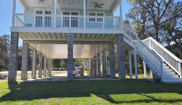 Newer riverfront home with great views and boat slip