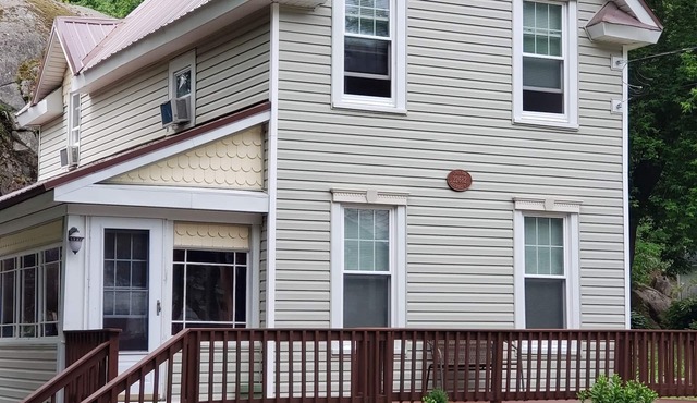 Relax Outdoors In This Updated Village Home. Walking Distance to Downtown