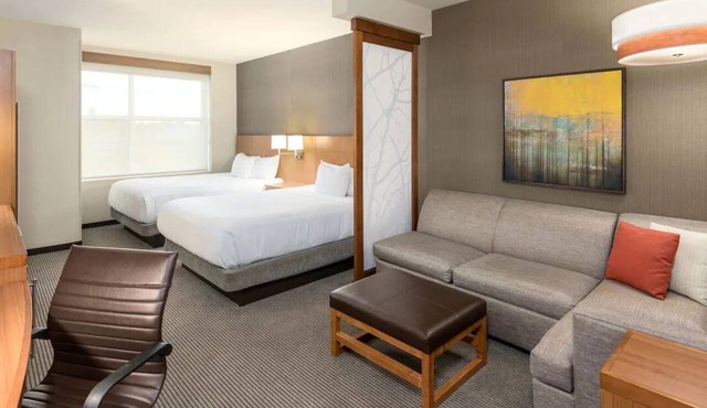 Relaxing 2 Queen Bed Stay Near Peace Center! Onsite Gym and Pool Access!