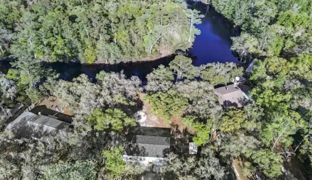 Riverfront Home on 1.6 Acres!