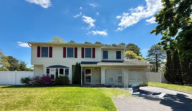 Spacious 4-bedroom home in Tinton Falls with a fenced-in large yard