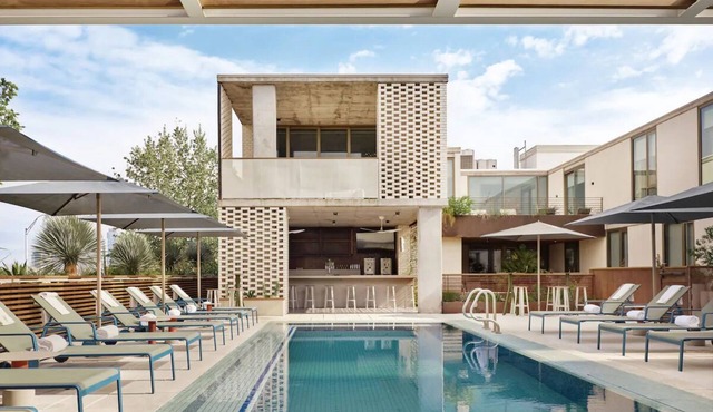 Studio-Style Suite with Balcony Overlooking Pool
